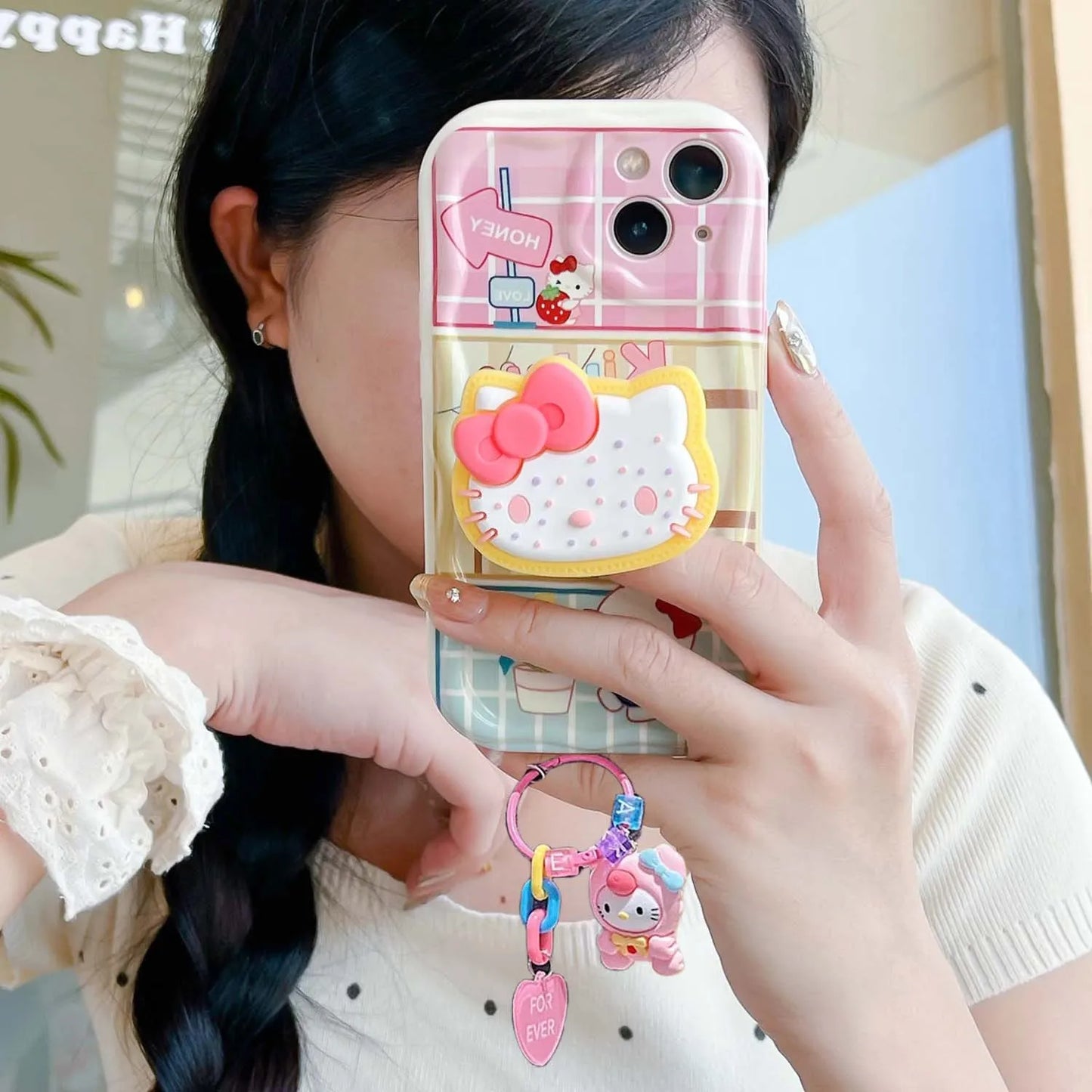 Funda Colgante Sanrio Hello Kitty y Kuromi para iPhone